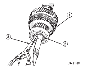 Fig. 51 Output Shaft Bearing Snap Ring Removal