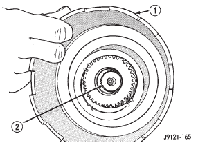 Fig. 210 Installing Assembled Sun Gear And Driving Shell On Output Shaft