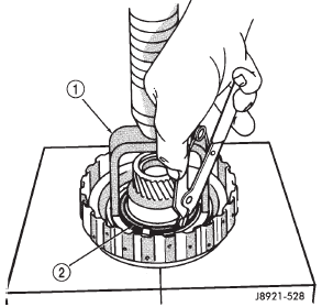 Fig. 209 Removing Clutch Piston Snap Ring