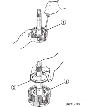 Fig. 217 Removing Snap Ring And Retaining Plate