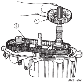 Fig. 24 Drive Sprocket And Chain Removal